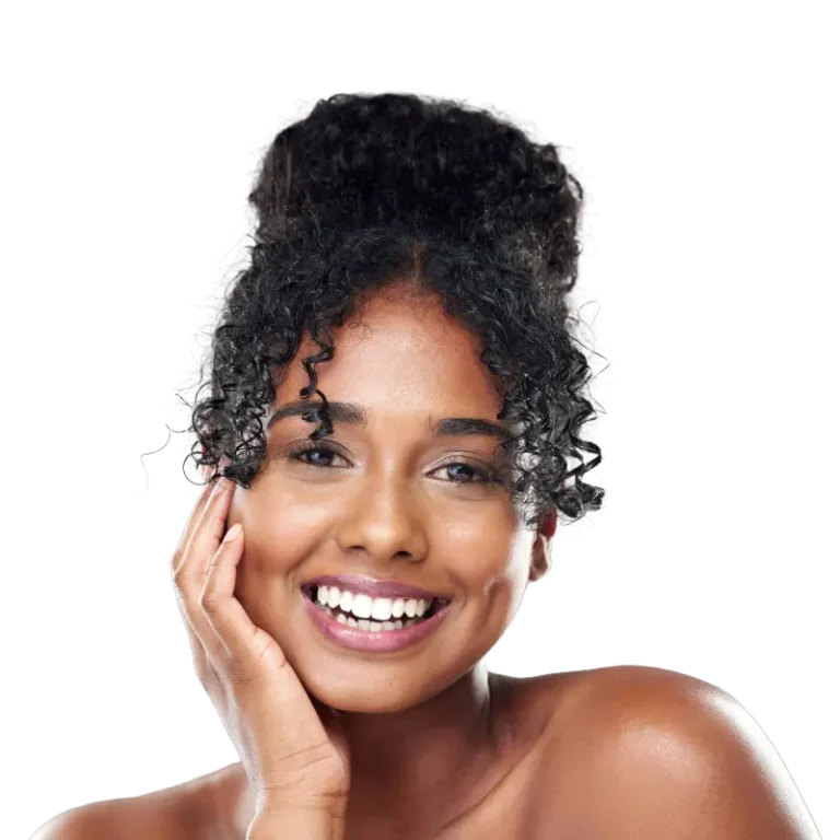 Beautiful black woman smiling at camera and soft radiant skin